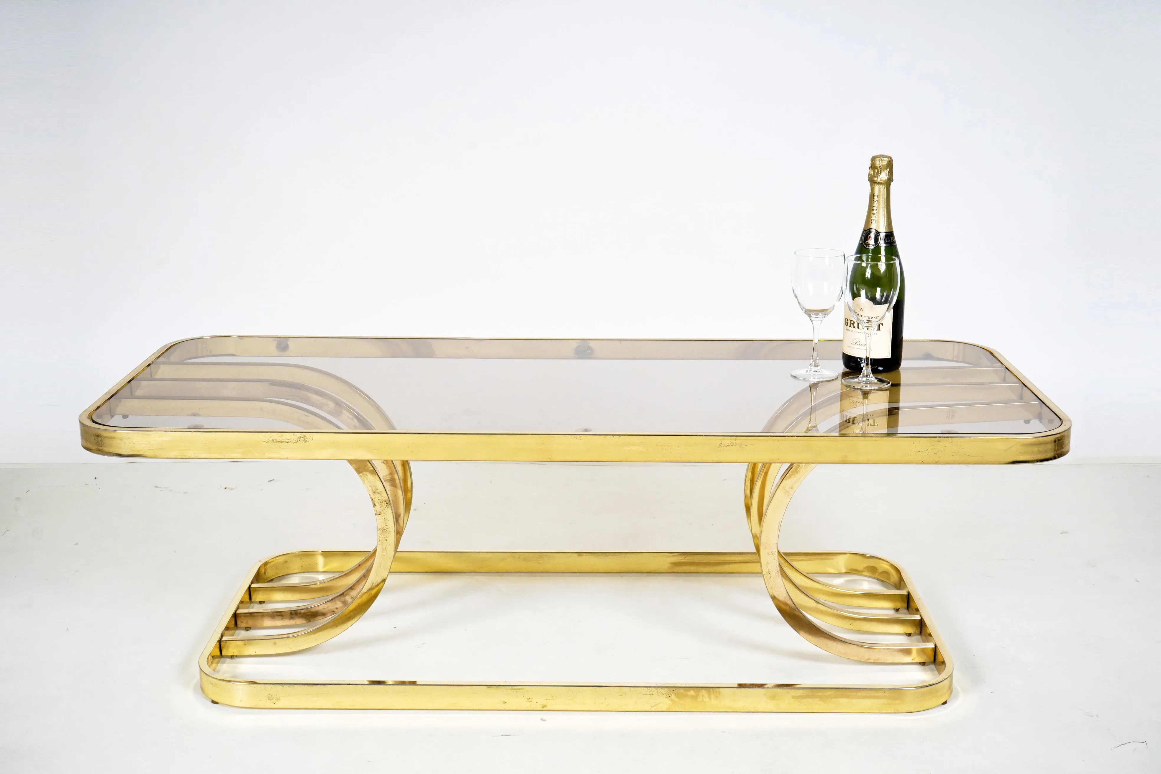 A Vintage Chrome Coffee Table With Glass Top