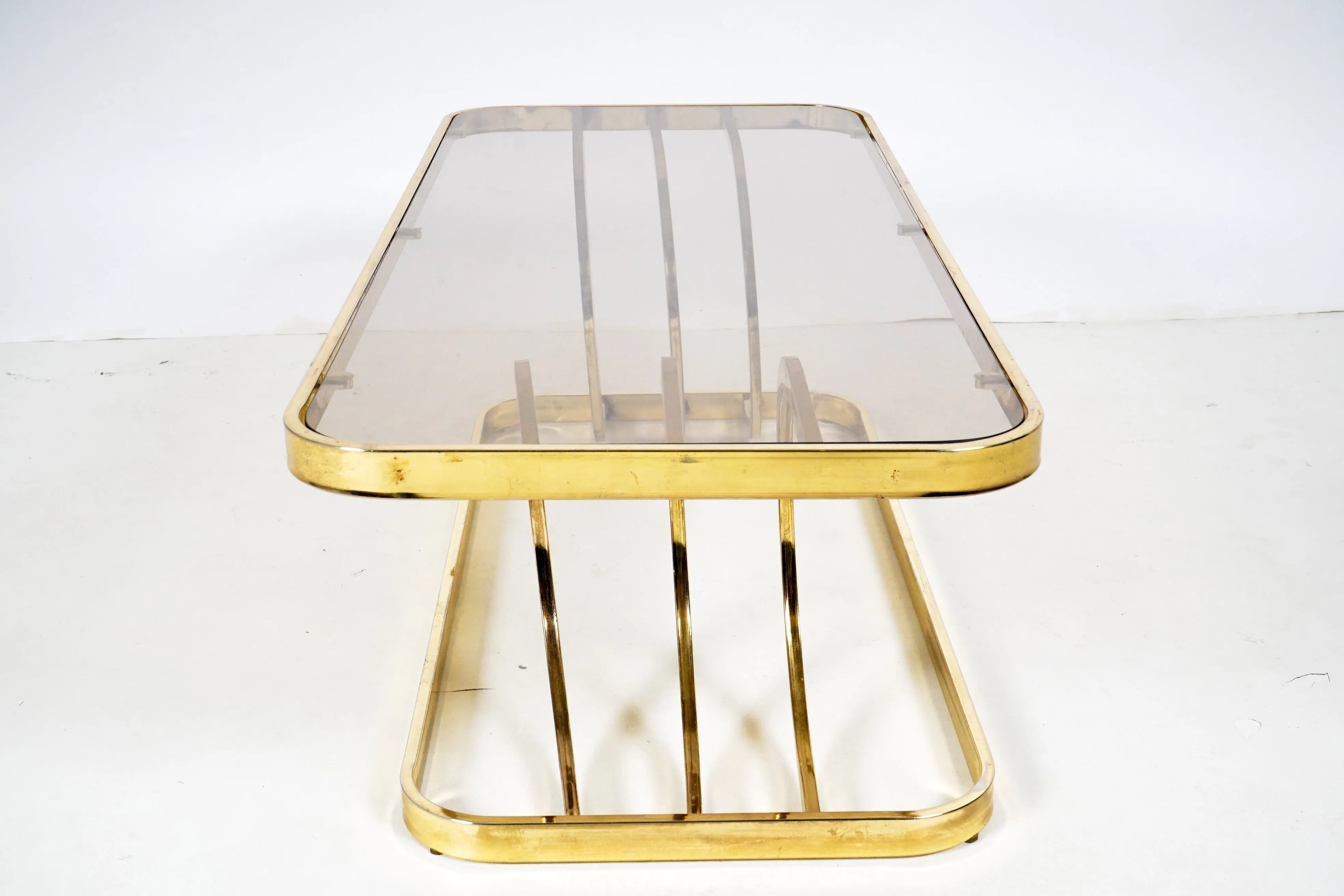 A Vintage Chrome Coffee Table With Glass Top